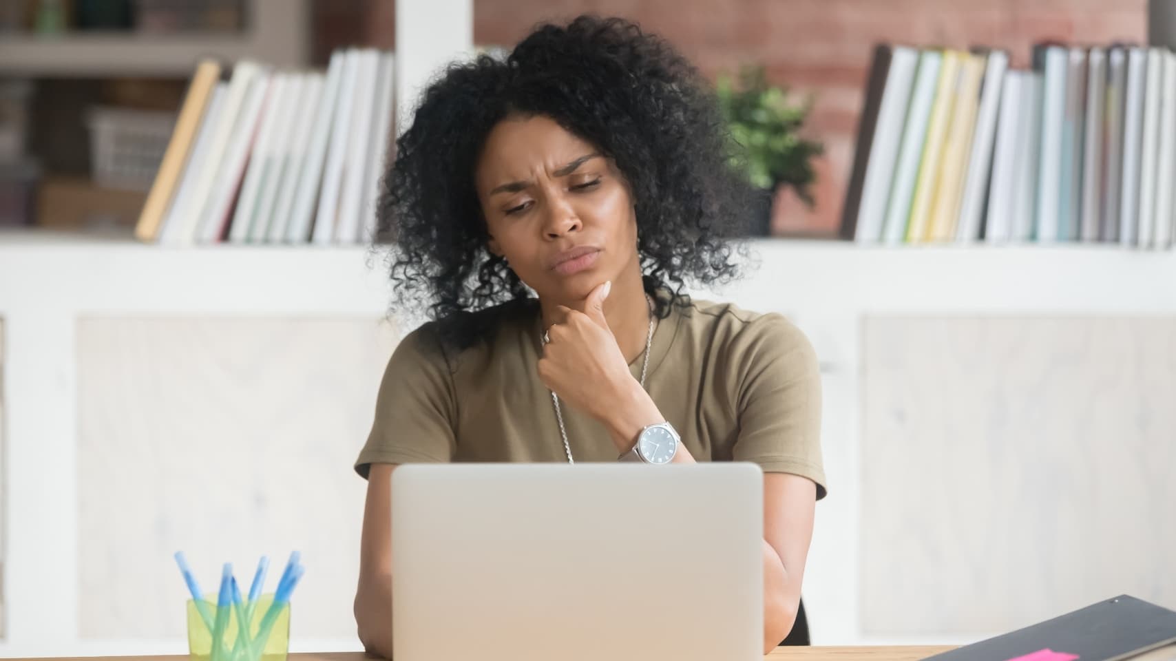 A person mid-thought, considering their next move.